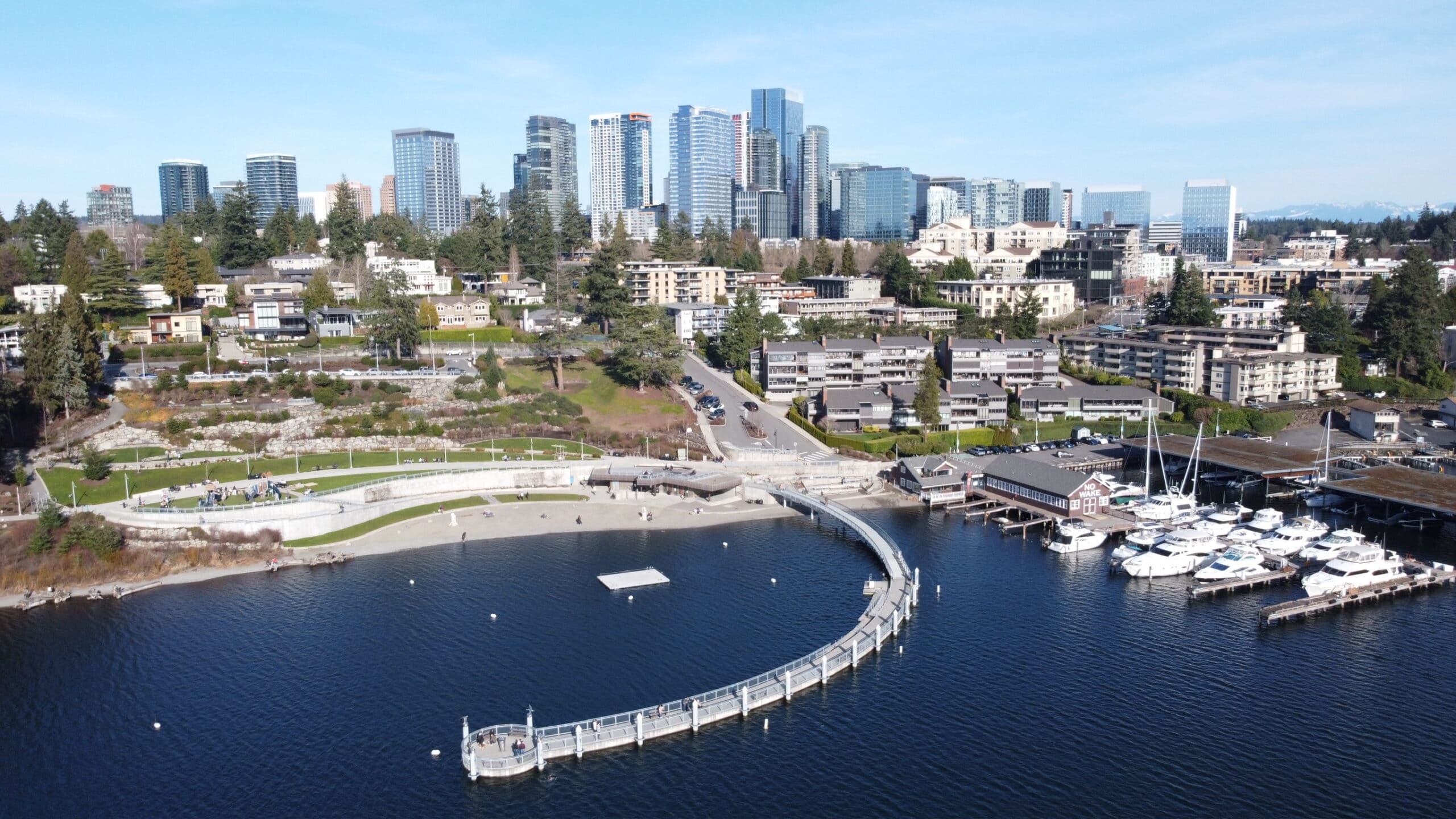 Downtown Bellevue skyline and Meydenbauer Bay from the air, with the apartment towers of the core in the foreground
